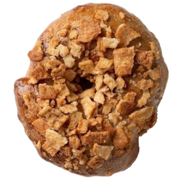 Top-down view of an Ugly Bagel, a golden-brown bagel covered in crunchy streusel topping.